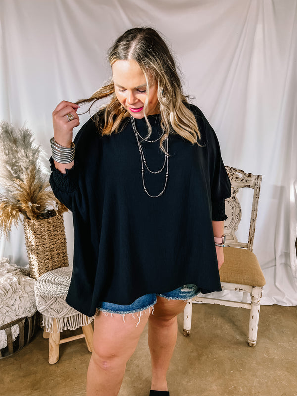 Growing and Glowing Smocked 3/4 Sleeve Oversized Blouse in Black