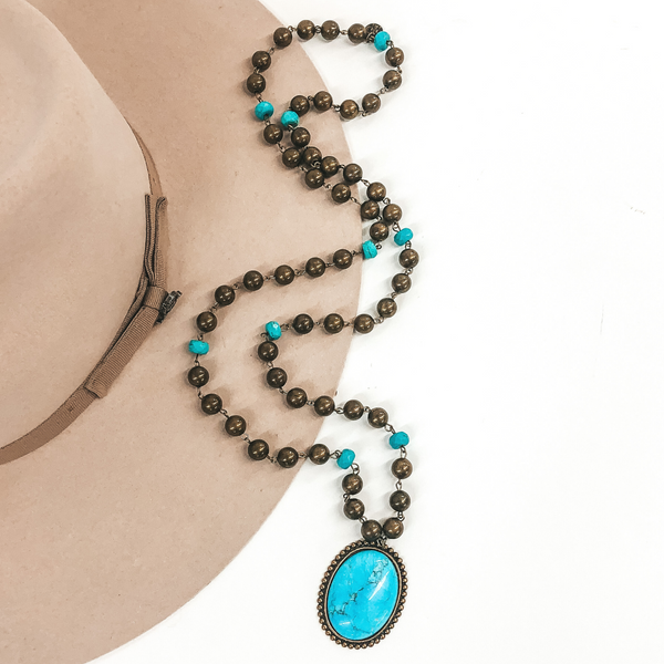 Pink Panache | Burnished Bronze and Turquoise Beaded Necklace with Medium Bronze Oval Turquoise Cabochon Pendant