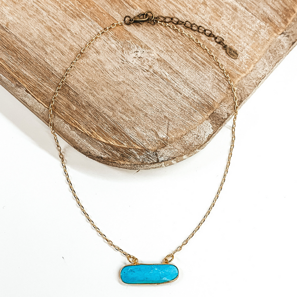 Pink Panache | Gold Chained Necklace with an Oval Bar Pendant in Turquoise
