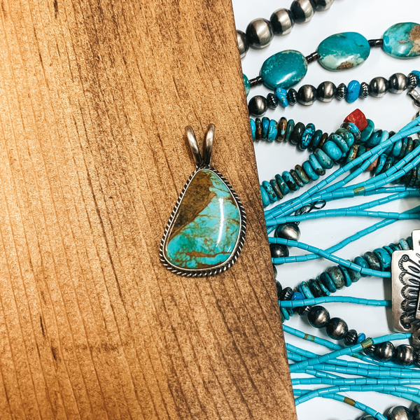 Dave Skeets  | Navajo Handmade Sterling Silver Asymmetrical Pendant with Royston Turquoise Stone