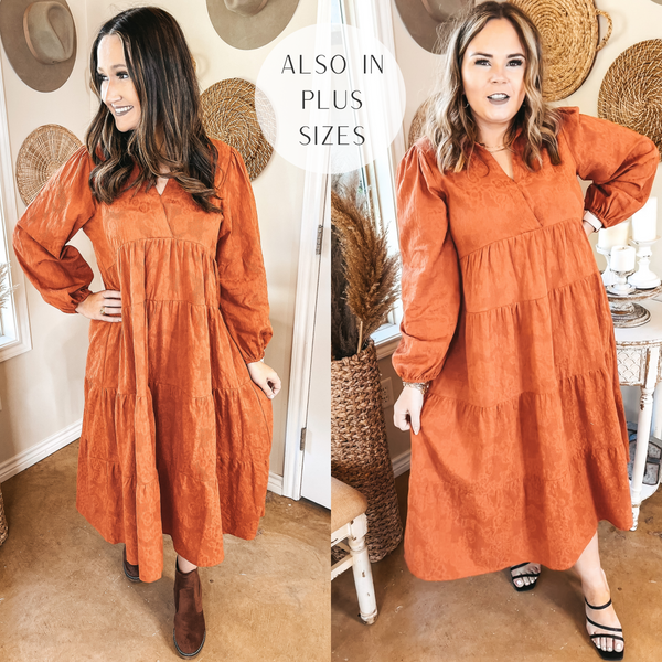 Models are wearing a long sleeve collared midi dress. The dress is tiered and a rust orange color. Model on the left has it paired with brown booties and jewelry. Model on the right has it paired with black strappy heels and gold jewelry.