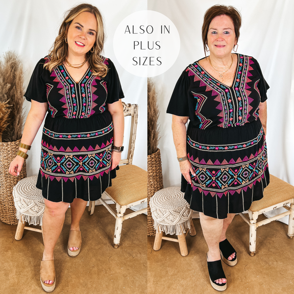Models are wearing a black dress that is knee length and has colorful embroidery all over the front. Size large model has it paired with tan wedges and gold jewelry. Plus size model has it paired with black wedges and gold jewelry.