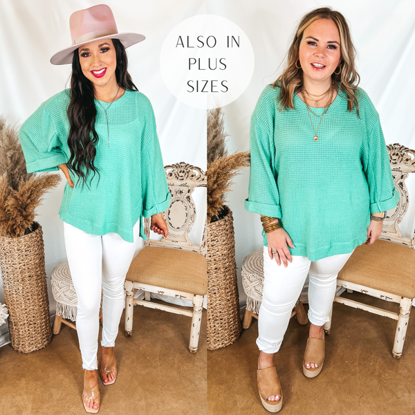 Models are wearing a mint green waffle knit top. Both models have it paired with white skinny jeans. Size small model has it paired with tan heels and a pink hat. Size large model has it paired with gold jewelry and tan wedges.