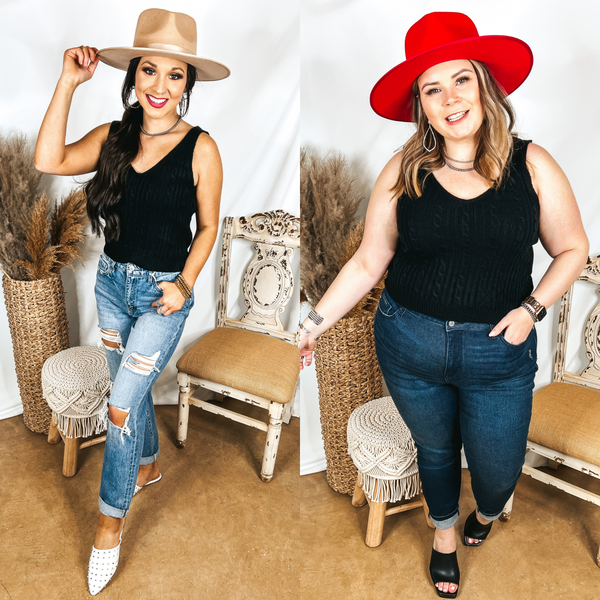 Models are wearing a black sweater tank top that is cropped. Size small model has it paired with light wash jeans, white mules, and a tan hat. Size large model has it paired with dark wash boyfriend jeans, black heels, and a red hat.