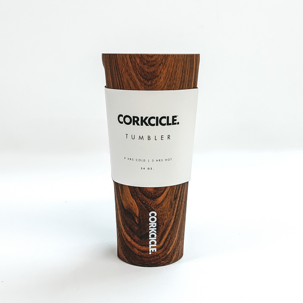 Dark wood patterned cup with the word "CORKCICLE." in white on the side. This cup is pictured on a white background with a white label around the top.