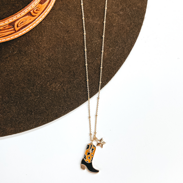 Kick Your Boots Up Gold Necklace with Cow Print Boot Pendant in Brown and Black