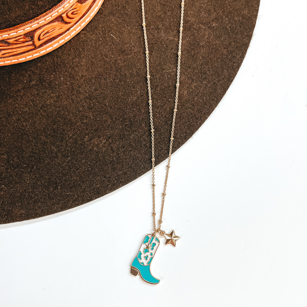 Kick Your Boots Up Gold Necklace with Cow Print Boot Pendant in White and Turquoise