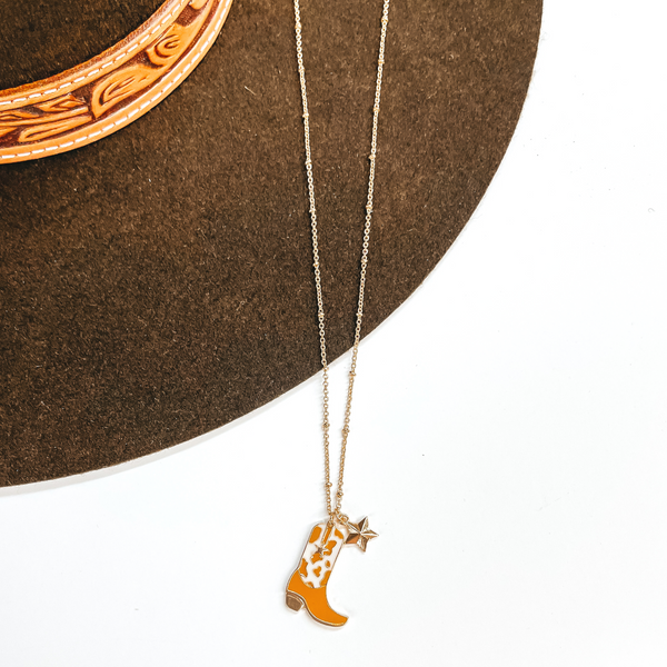 Kick Your Boots Up Gold Necklace with Cow Print Boot Pendant in Ivory and Tan
