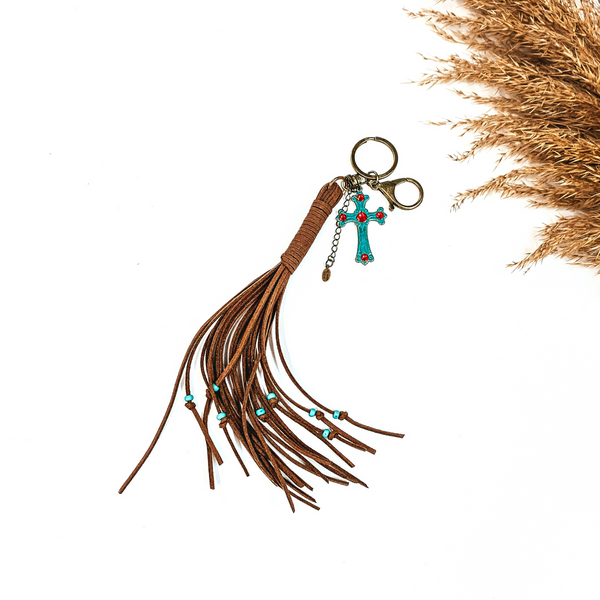 Pink Panache | Brown Leather Tassel Keychain with Turquoise Cross Charm and Red Crystals