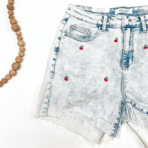 Judy Blue | Cherry Embroidered Cut Off Denim Shorts in Acid Wash