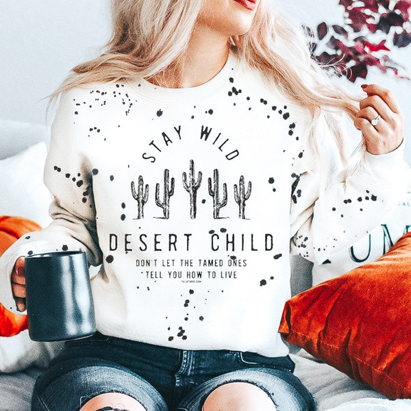 Stay Wild Desert Child Long Sleeve Paint Splatter Graphic Sweatshirt in White