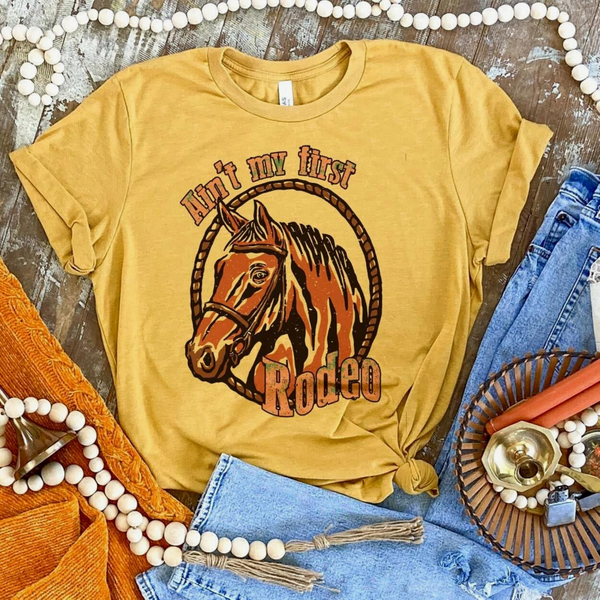 Ain't My First Rodeo Short Sleeve Graphic Tee in Mustard Yellow