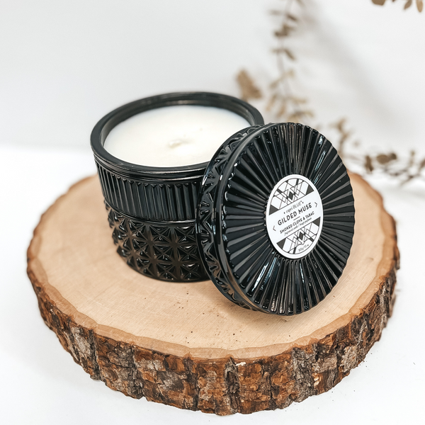 Capri Blue | 11 oz. Black Faceted Candle | Smoked Clove and Tabac