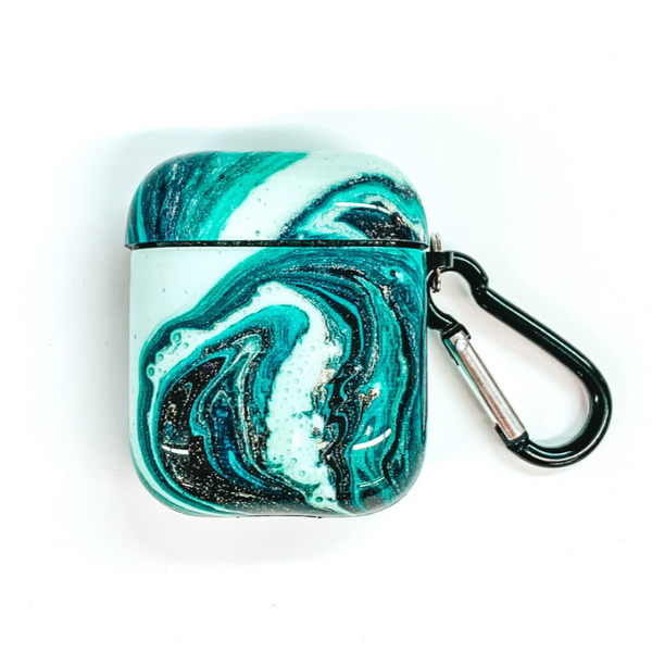 Marble designed airpod case in a teal mix of colors. This airpod case has a black and silver clip. This airpod case is pictured on a white background. 