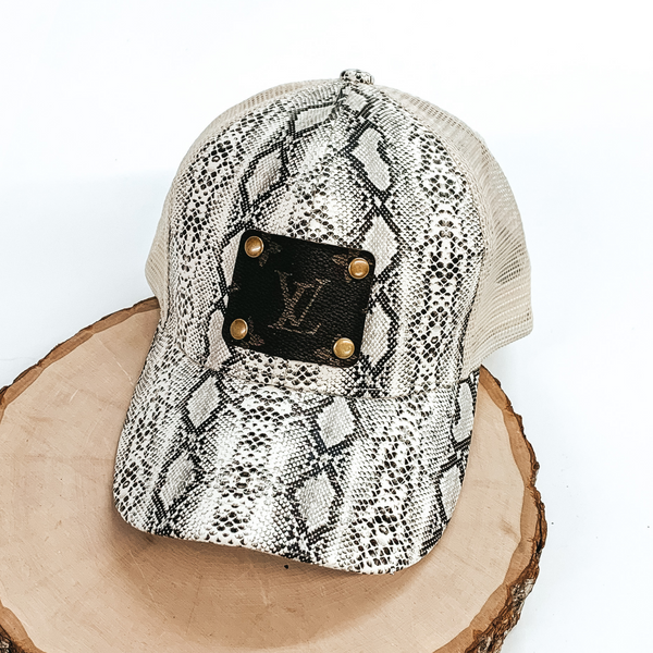 Ivory Hat with Black Snakeskin Pattern and Leather Patch