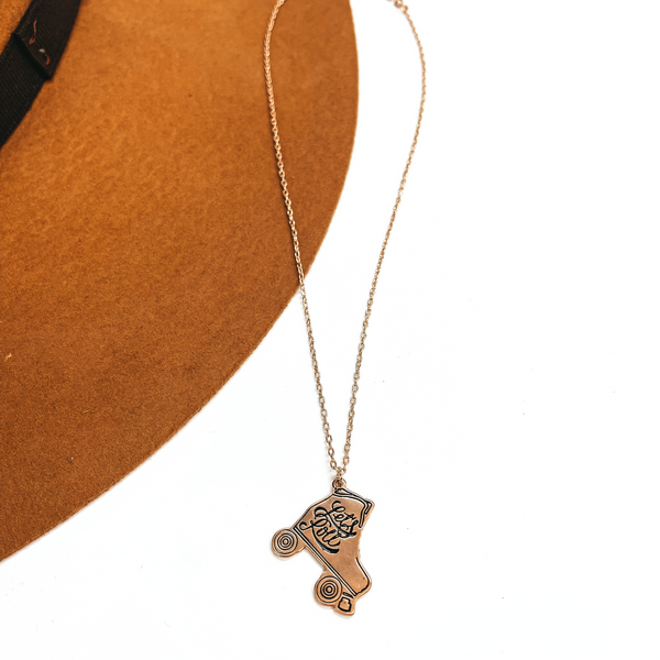 Let's Roll Gold Tone Necklace with Rollerskate Pendant